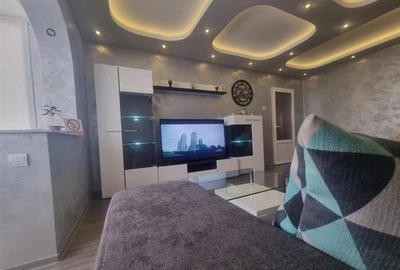 Apartament cu 3 camere decomandat, mobilat în Tractorul