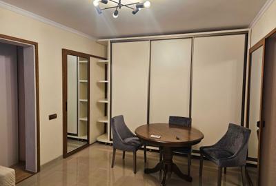 Apartament cu 3 camere semidecomandat în Central - 1