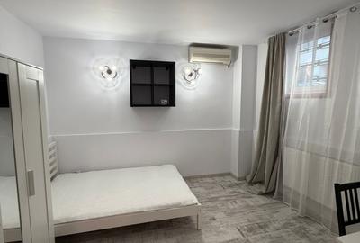 Garsonieră decomandată, mobilată în P-ța Victoriei