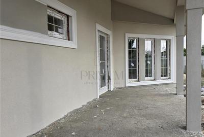 Casa individuala - teren 730 mp - garaj - 5 dormitoare - living 57 mp - 5