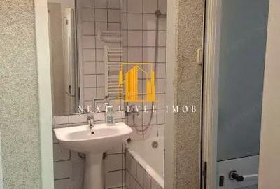 Garsonieră decomandată în Central - 7