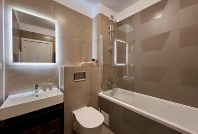 Apartament cu 2 camere semidecomandat, mobilat în Tractorul - 16