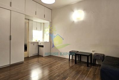 Garsoniera in Piata Romana, la coloane! - 1