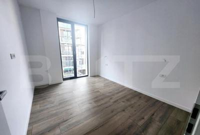 Apartament cu 3 camere,decomandat,68 mp,bloc nou,parcare sub - 6