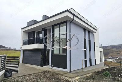 Proprietate moderna cu design exterior deosebit in Popesti - 2