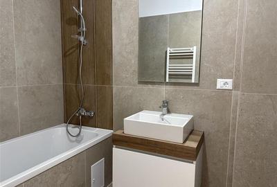 Apartament cu 2 camere decomandat în Tractorul - 21