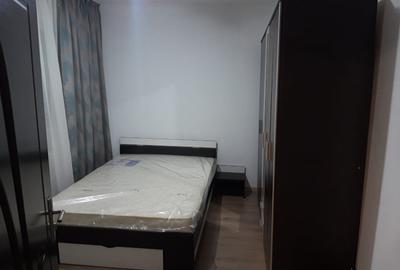 Apartament cu 2 camere semidecomandat, mobilat în Podu Roș
