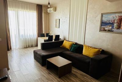 Apartament cu 2 camere semidecomandat, mobilat în Central