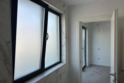 Eleganță Contemporană pe Trei Niveluri - Triplex cu Terase Panoramice - 8