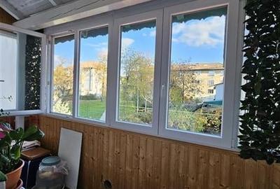 Apartament cu GRADINA SI ACOPERIS  MANSARDA DE VANZARE IN ONESTI ETJ 1 - 2