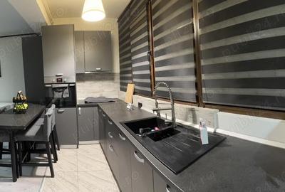 Apartament cu 3 camere decomandat în Roșu - 1