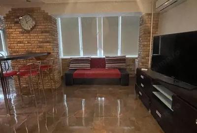 Garsonieră decomandată în Titan