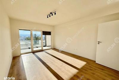Apartament cu 3 camere decomandat în Cristian - 1