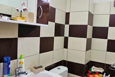 Locuinta individuala(apartament 4 camere)+spatiu comercial si teren ,Darmanesti - 10