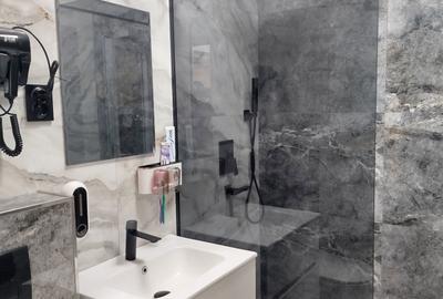 Garsonieră decomandată în Central - 7