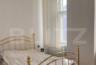 Apartament cu 3 camere semidecomandat, mobilat în Central
