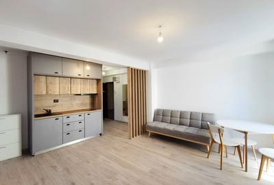 Apartament cu 3 camere semidecomandat, mobilat în Central