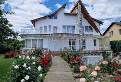 Casă cu 6 camere cu Teren 1170 Mp în Tractorul