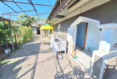 Teren 371 mp curti constructii+casa 5 camere si anexe, zona Izvoare