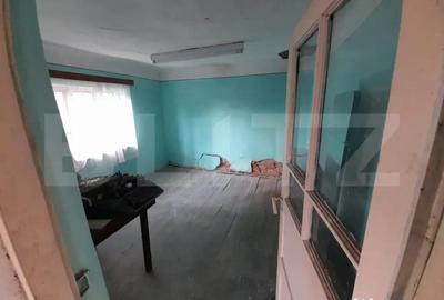 Casă cu 2 camere cu Teren 1160 Mp în Central