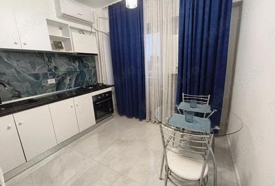 Garsonieră decomandată în Central - 7