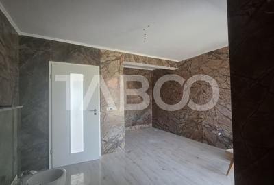 Casa de vanzare 405 mp utili 2 garaje 250 mp terase Slimnic Sibiu - 4