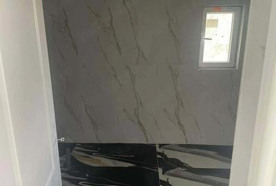 Casă cu Teren 1000 Mp în Central