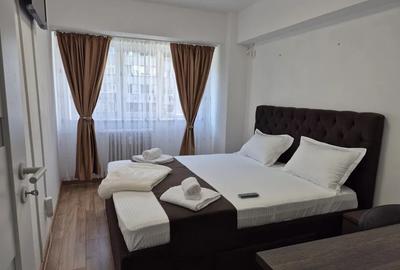 Apartament cu 3 camere decomandat, mobilat în P-ța Victoriei
