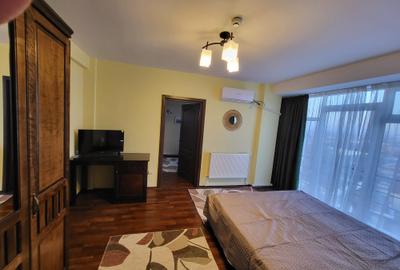 Apartament cu 2 camere semidecomandat, mobilat în Bucium - 9