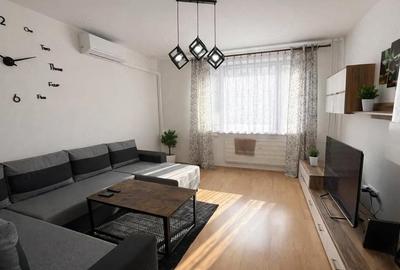 Apartament cu 2 camere decomandat în Tractorul