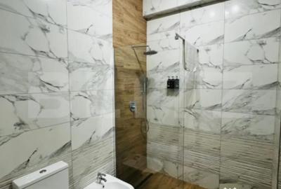 Garsonieră decomandată în Central - 7