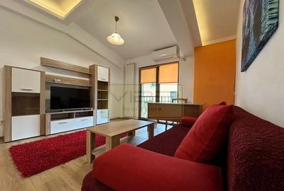 Apartament cu 2 camere semidecomandat, mobilat în Podul de Fier