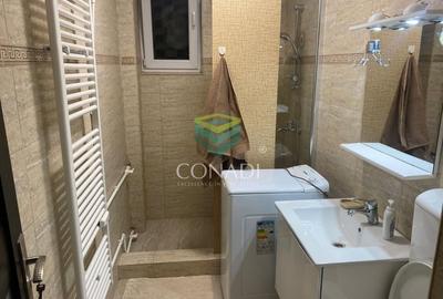 Apartament cu 3 camere semidecomandat, mobilat în Calea București - 10