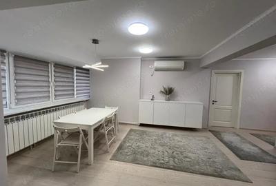 Apartament cu 4 camere decomandat în E3
