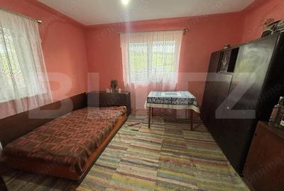 Casă cu Teren 1600 Mp în Huseni - 1