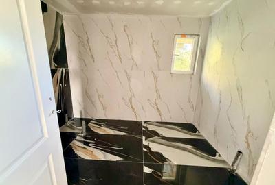 Casă cu 4 camere în Bâlteni - 3