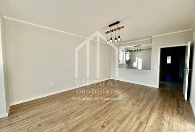 Ap. cu 3 camere  etaj intermediar  - 75mp utili + terasa - intabulat - 3