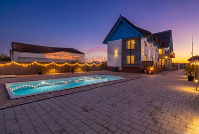 Casă cu 7 camere cu Teren 1023 Mp în Murighiol - 1