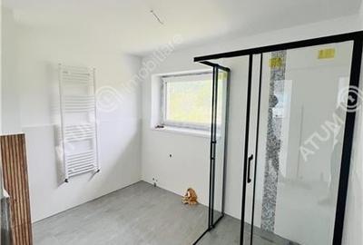 Casa individuala in Cisnadioara cu 4 camere 2 bai terasa teren 1170 mp - 8