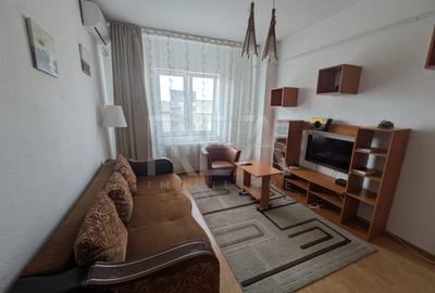 Apartament cu 2 camere semidecomandat, mobilat în Romană