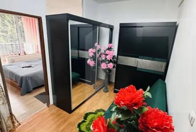 Apartament cu 2 camere semidecomandat, mobilat în UTA