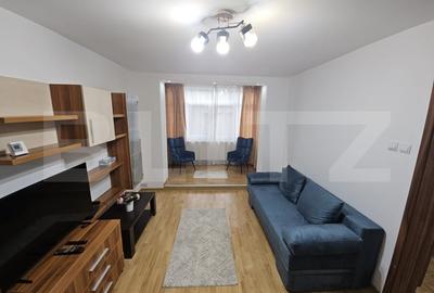Apartament cu 2 camere semidecomandat, mobilat în Podu Roș