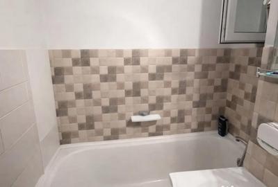 Apartament cu 4 camere decomandat în Calea București