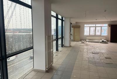 Cladire de birouri si spatii comerciale P+4E, stradal la DN1 - 12
