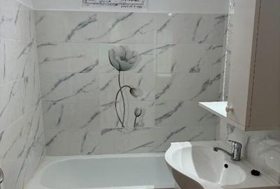 Apartament cu 3 camere decomandat în Roman - 5