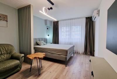 Garsonieră decomandată, mobilată în 1 Mai - 9