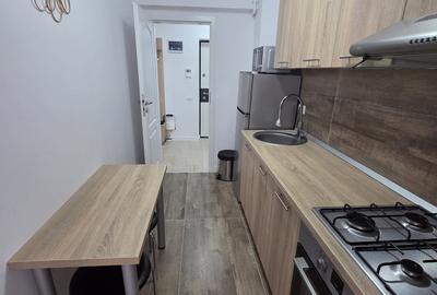 Garsonieră decomandată în Central - 7
