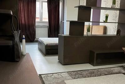 Garsonieră decomandată în Central - 7