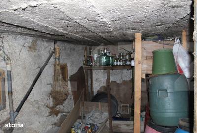 Casă cu 4 camere cu Teren 1500 Mp în Vâlcele - 11
