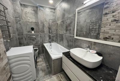 Garsonieră decomandată în Titan